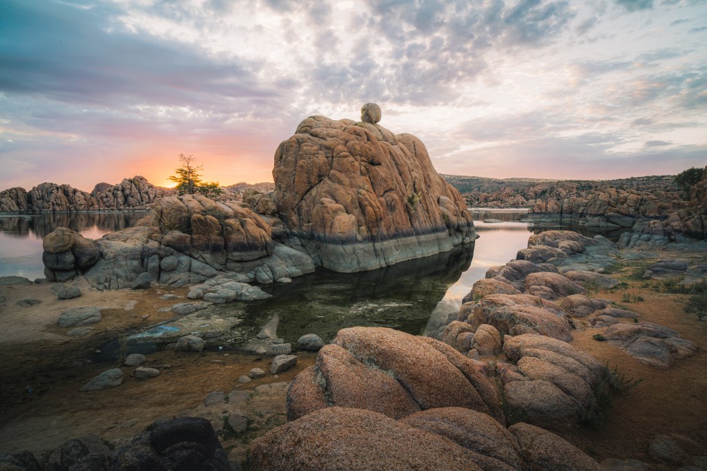 A photograph of the sunrise at Watson Lake in Prescott, Arizona